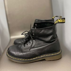 Doc Martens size 10 or 11 mens boots. Tape measure in picture with boot.